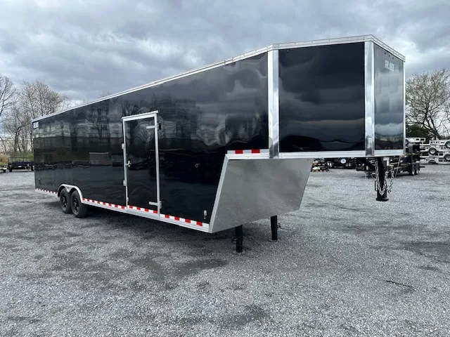 Car-Mate-8.5-x-38-Gooseneck-Enclosed-Cargo-Trailer-Rear-Ramp-Door-Car-Hauler-Get-Out-Door-Aluminum-Wheels-4.webp Car Mate 8.5 x 38 Enclosed Gooseneck Trailer Aluminum Wheels - Image 1